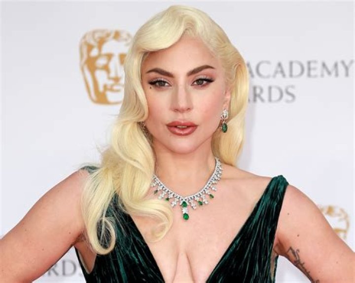 Lady Gaga Does a Yoga Headstand in Tight Blue Workout Pants